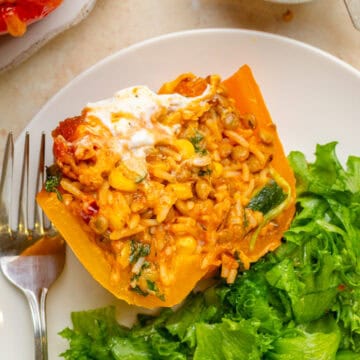 Stuffed pepper sliced in half.