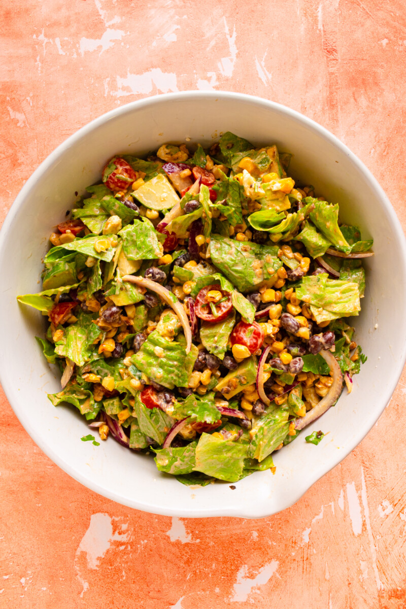Santa Fe Salad tossed together in a salad bowl.