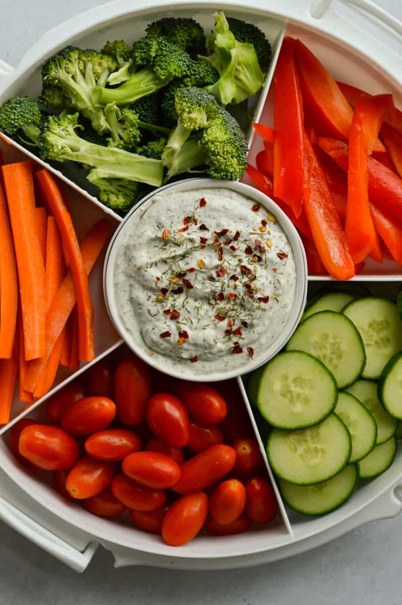 Meal prep veggie tray with cottage cheese dip.