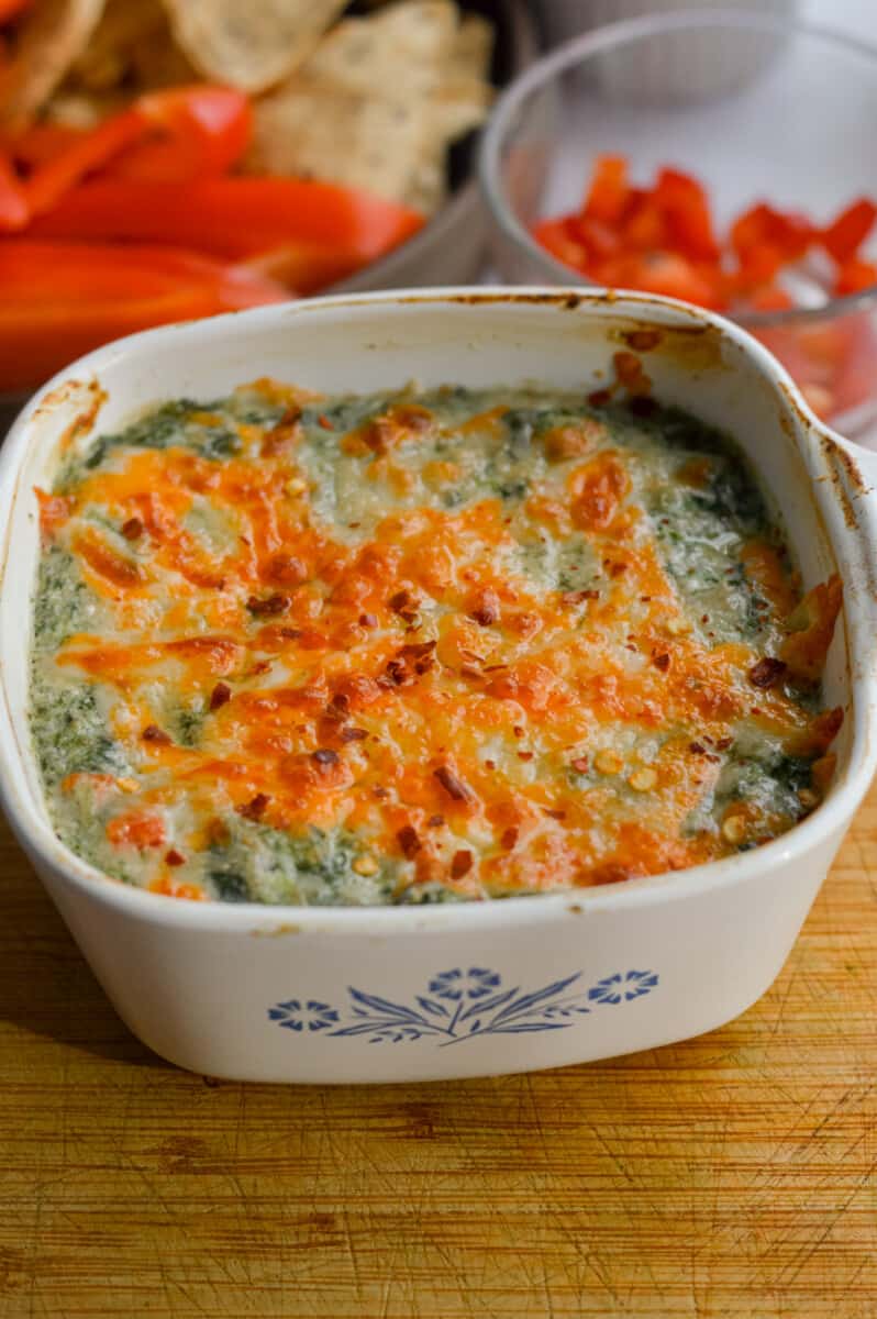 Spinach cottage cheese dip with broiled cheese on top.
