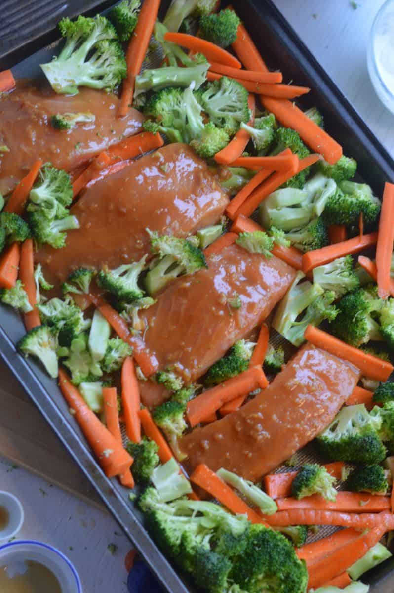 Miso maple salmon and veggies on a tray.