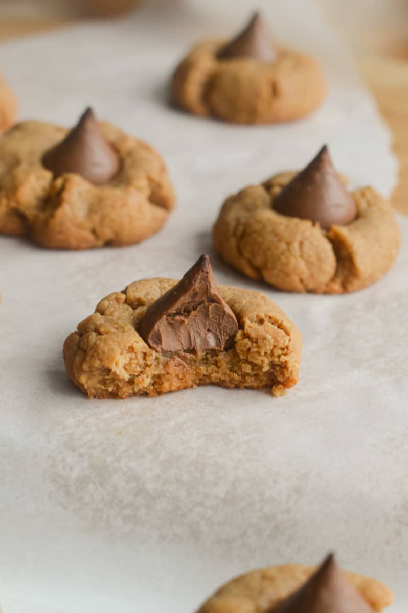 3 ingredient peanut butter blossoms with a bite taken out of it