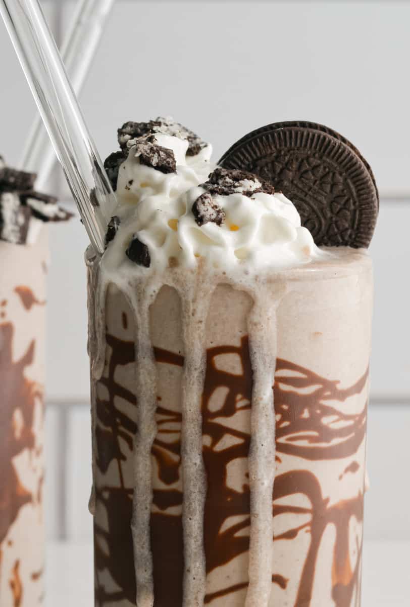 Oreo protein shake dripping out of the glass.