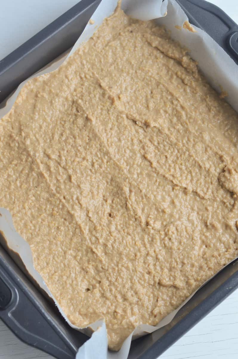 Chickpea blondie batter poured into a baking pan.