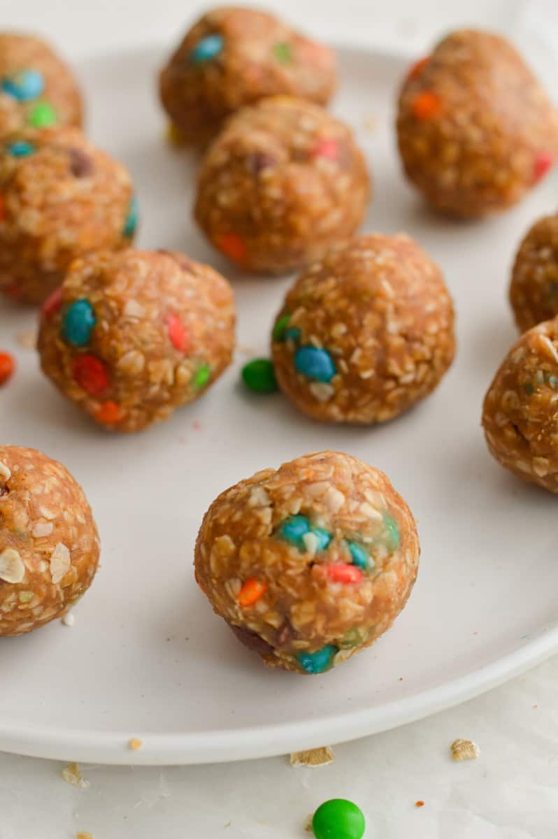 Close up of 3-ingredient peanut butter oatmeal balls on a plate.