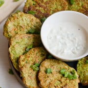 Zucchini and edamame fritters served with dip.