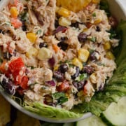 Mexican tuna salad served with chips and cucumbers.