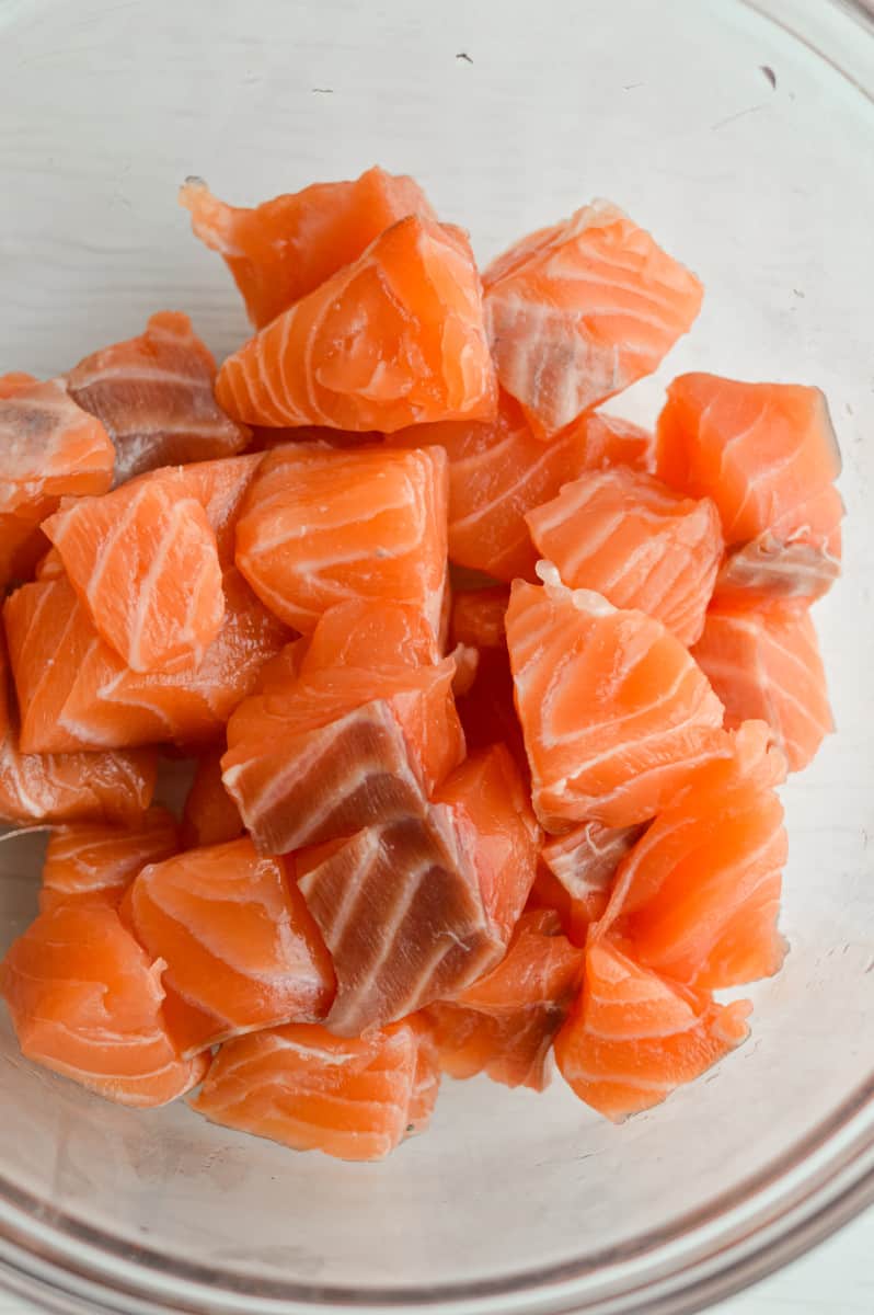Cubed salmon in a bowl.