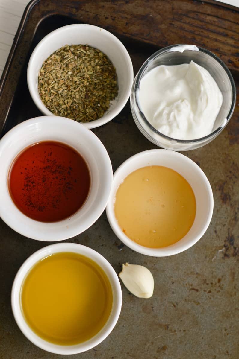 Ingredients for creamy Italian dressing.