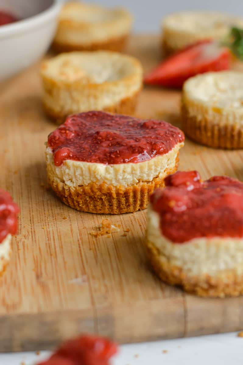 Close up of mini protein cheesecake topped with chia jam.
