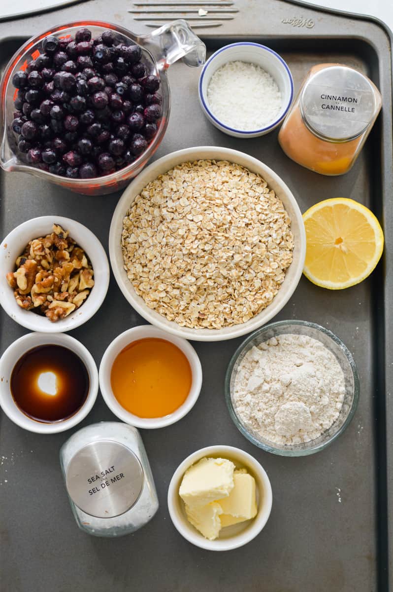 Ingredients including blueberries, walnuts, hemp hearts, vanilla, lemon, oats, honey, oat flour and coconut.