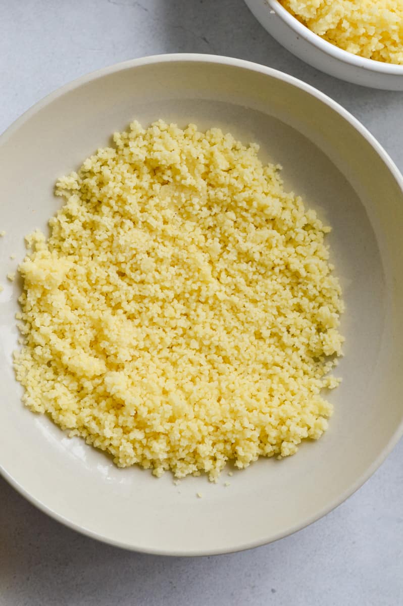 Cooked couscous in a bowl.