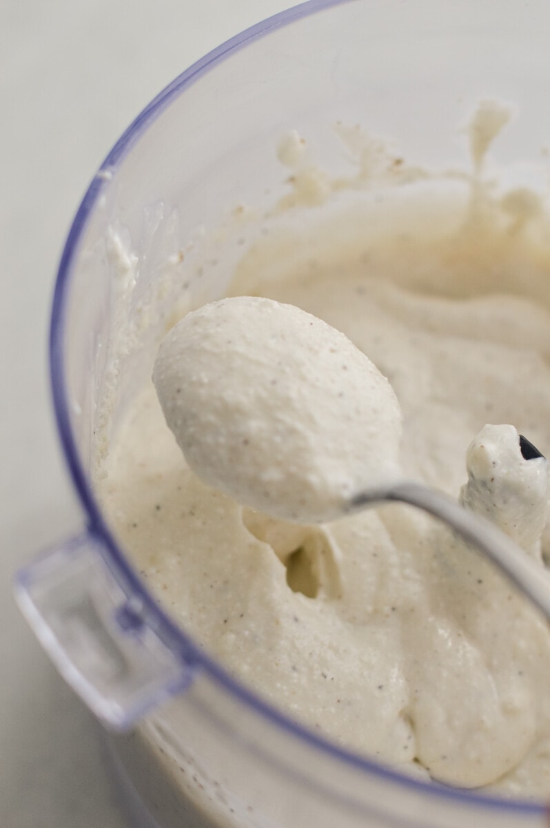 Blending cottage cheese alfredo sauce.
