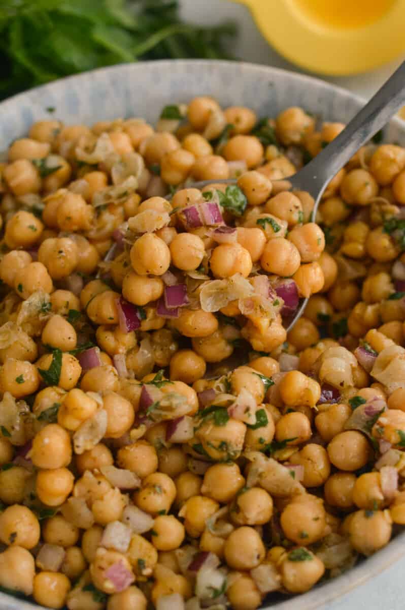 Close up of Greek marinated chickpeas in a bowl.
