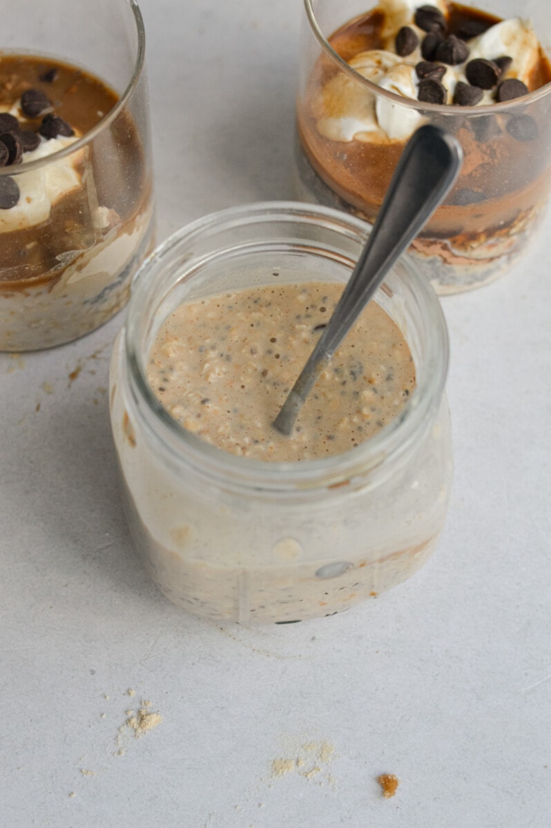 Mixing all cookie dough overnight oat ingredients in a mason jar.
