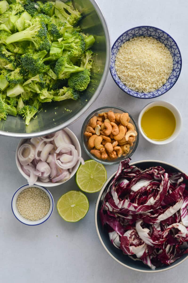 Ingredients including broccoli, panko breadcrumbs, olive oil, cashews, shallots, lime, raddichio and seasoning.