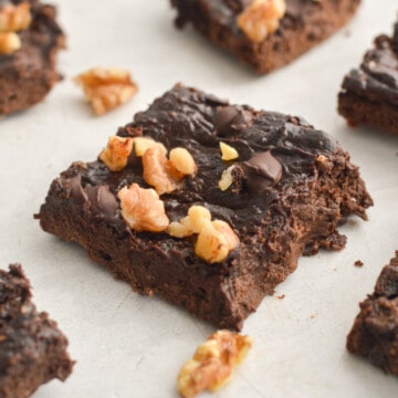 3 ingredient brownie topped with walnuts.