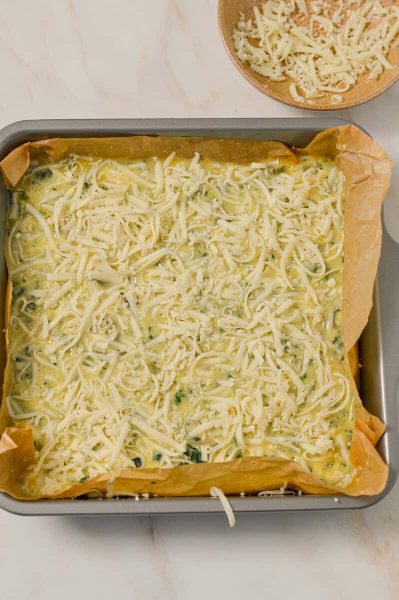 Mozzarella cheese added on top of the casserole