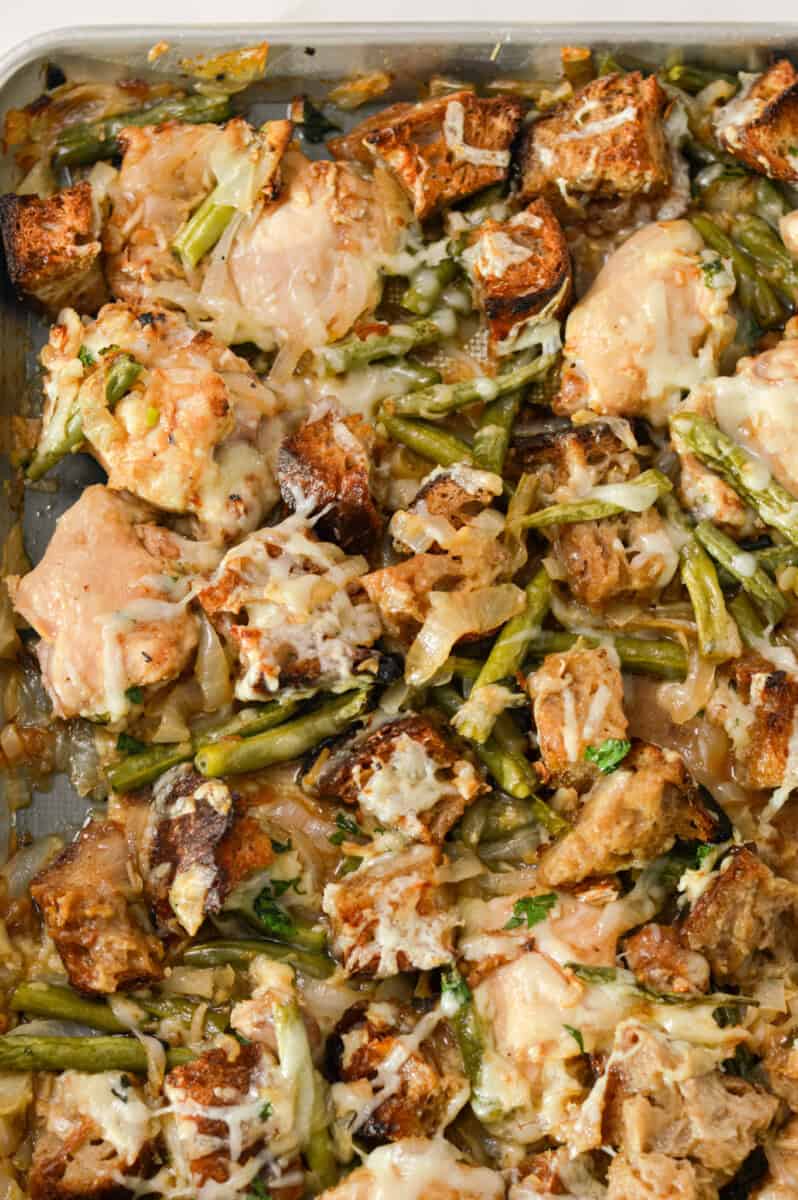 Finished sheet pan chicken with melted cheddar