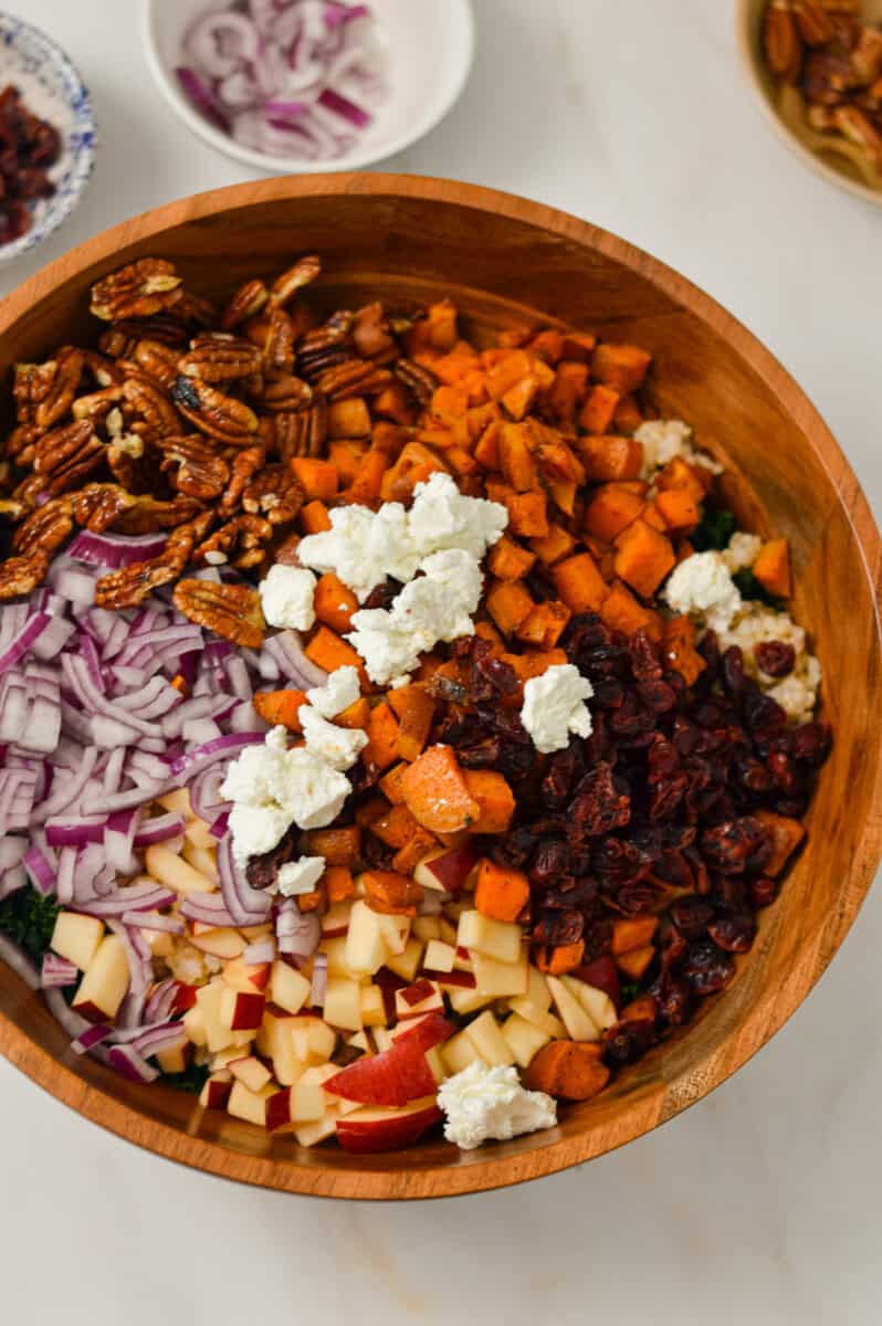 All ingredients for the salad added to a large mixing bowl