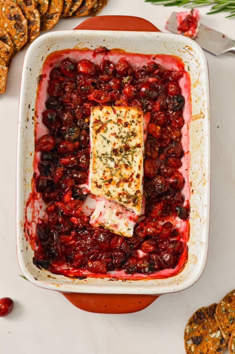 Birdseye view of the feta block in the casserole dish after baking