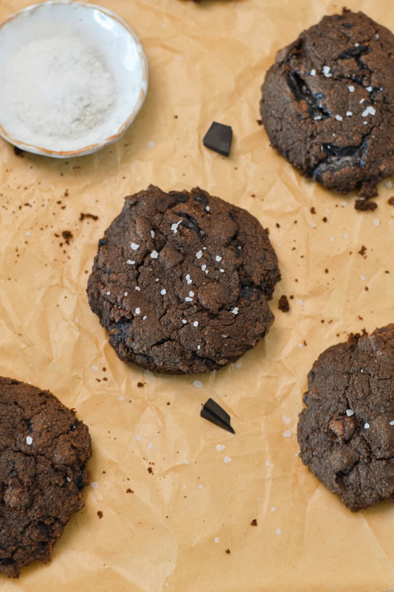 Finished cookies on a baking sheet with sea salt on top