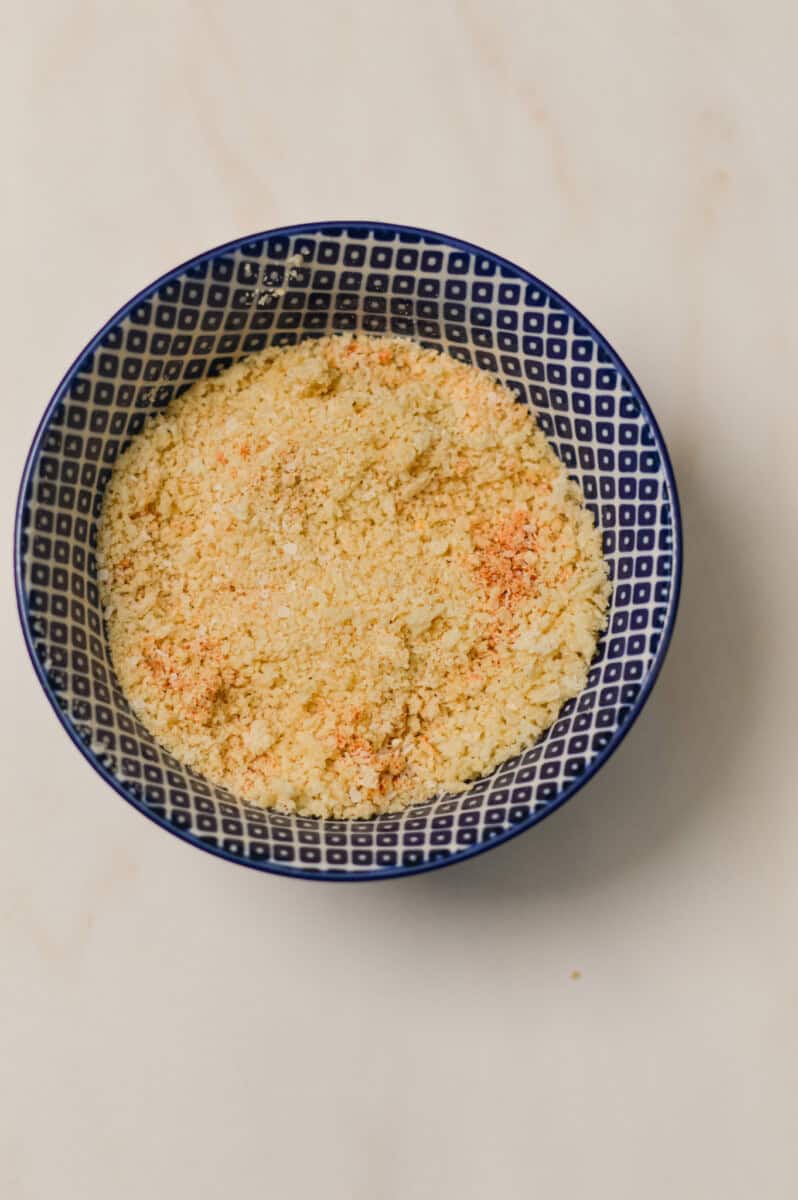 Panko breadcrumbs combined with spices in a small bowl