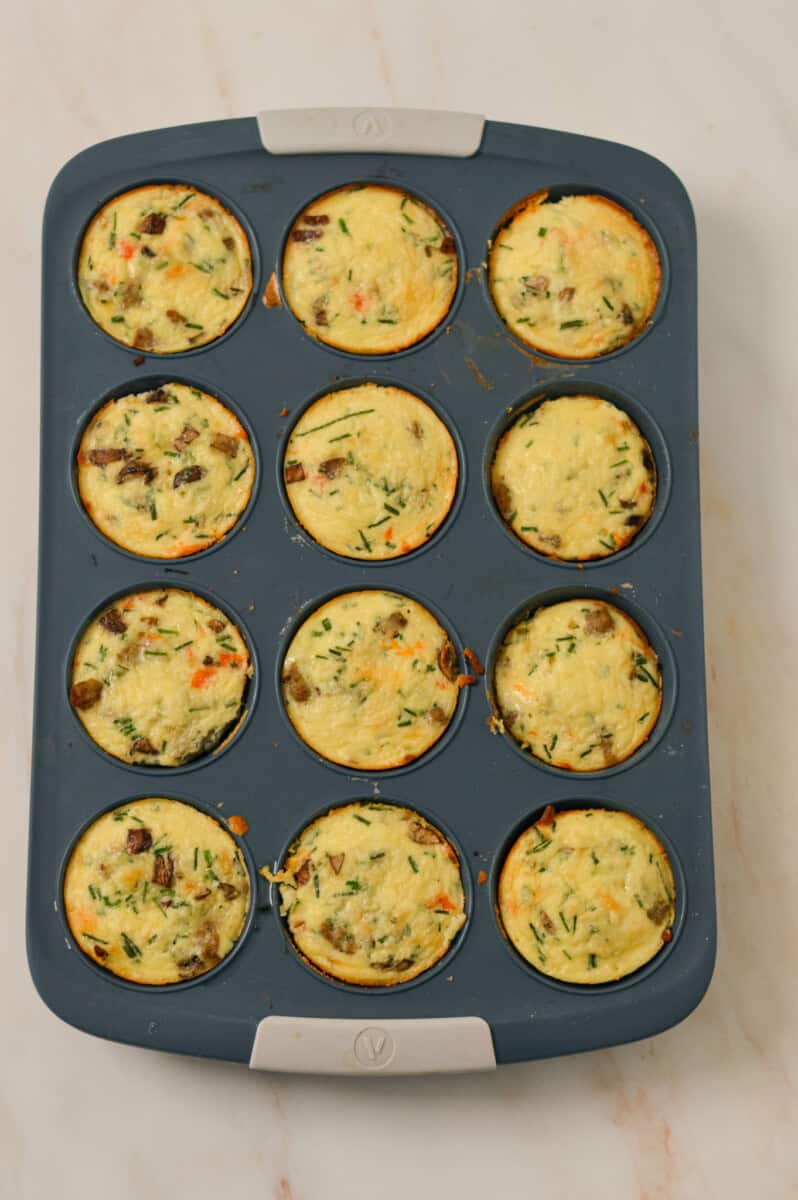 Hashbrown egg cups fully cooked in a muffin tray