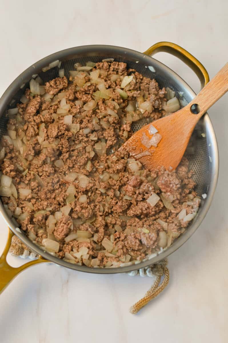 Ground beef cooking on a skillet