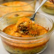 Fork lifting up a bite of the meal prep breakfast bowls