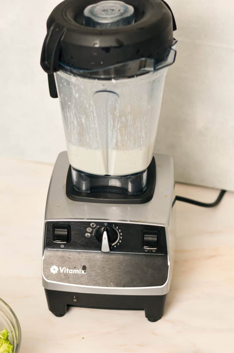 Ingredients for the sauce being blended in a blender