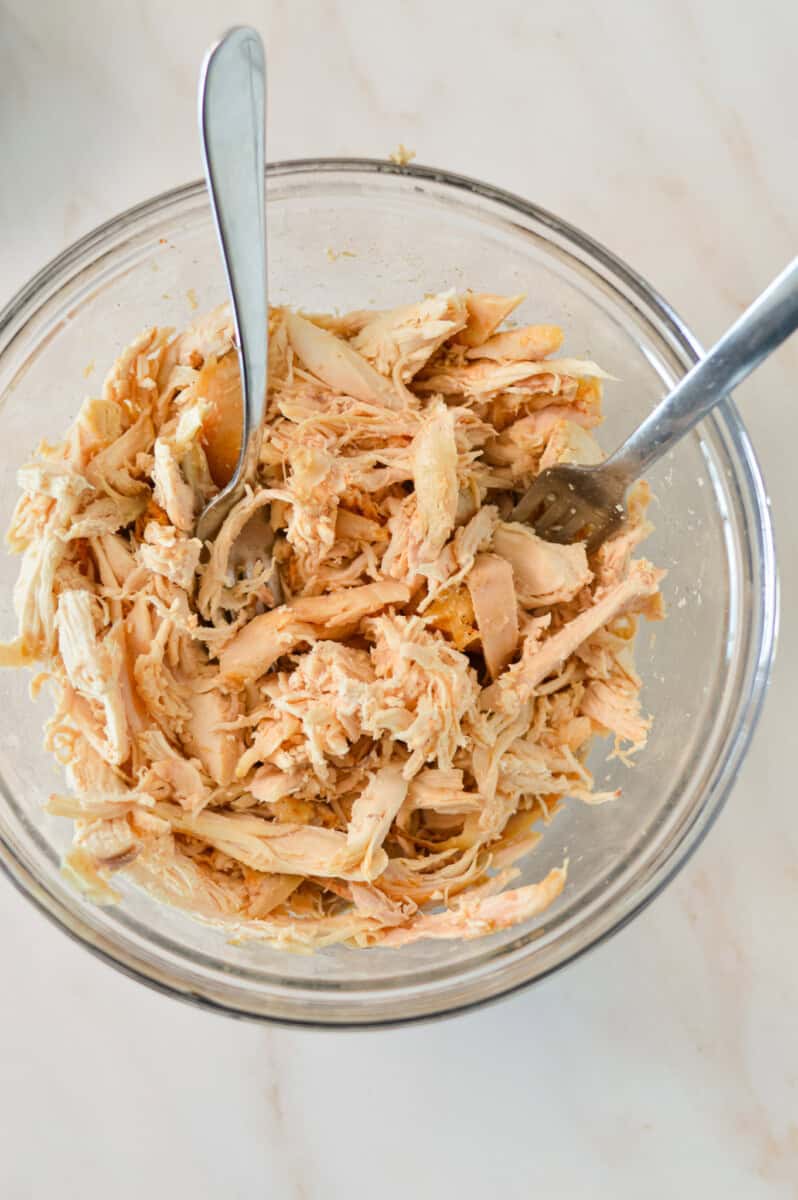 Shredded rotisserie chicken in a bowl