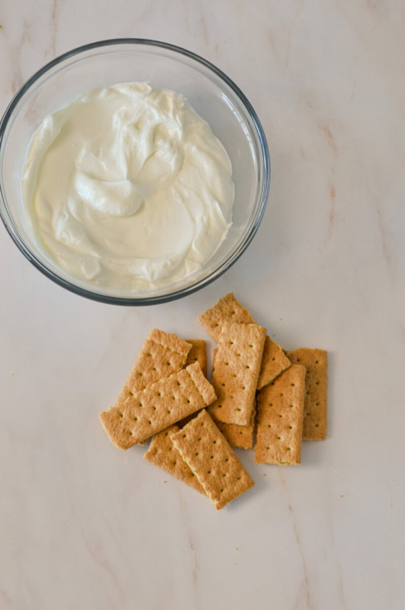 Ingredients for the base recipe including Greek yogurt and graham crackers