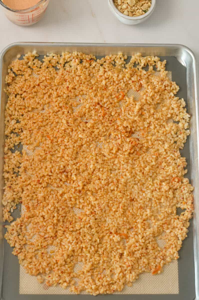 Crispy rice salad on a baking sheet
