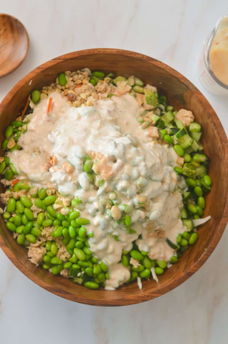 Dressing poured onto the rice salad