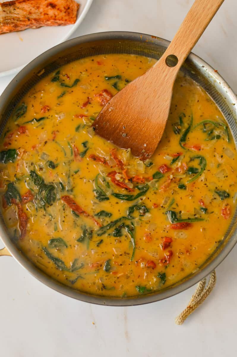 Coconut milk added to a pan