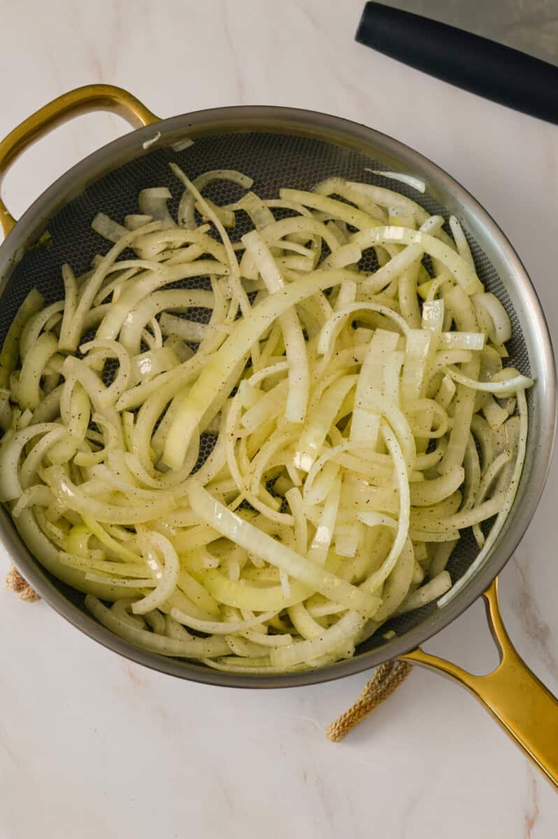 Sliced onions in a pan