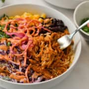 easy bbq pulled pork crockpot bowl with a fork