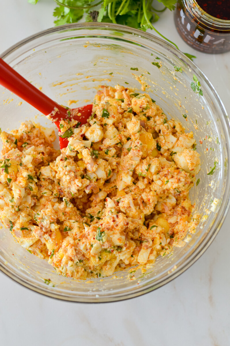 Mayo free egg salad mixed in a bowl.