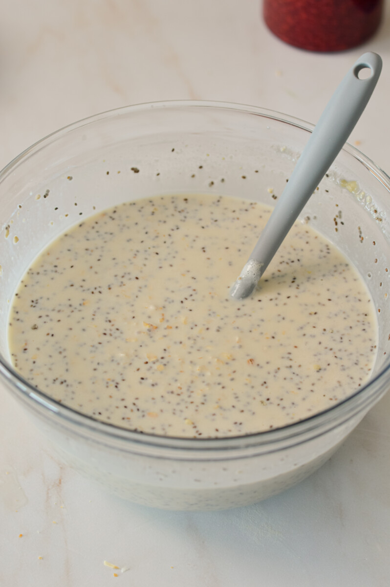 Overnight oats batter being mixed in a bowl.