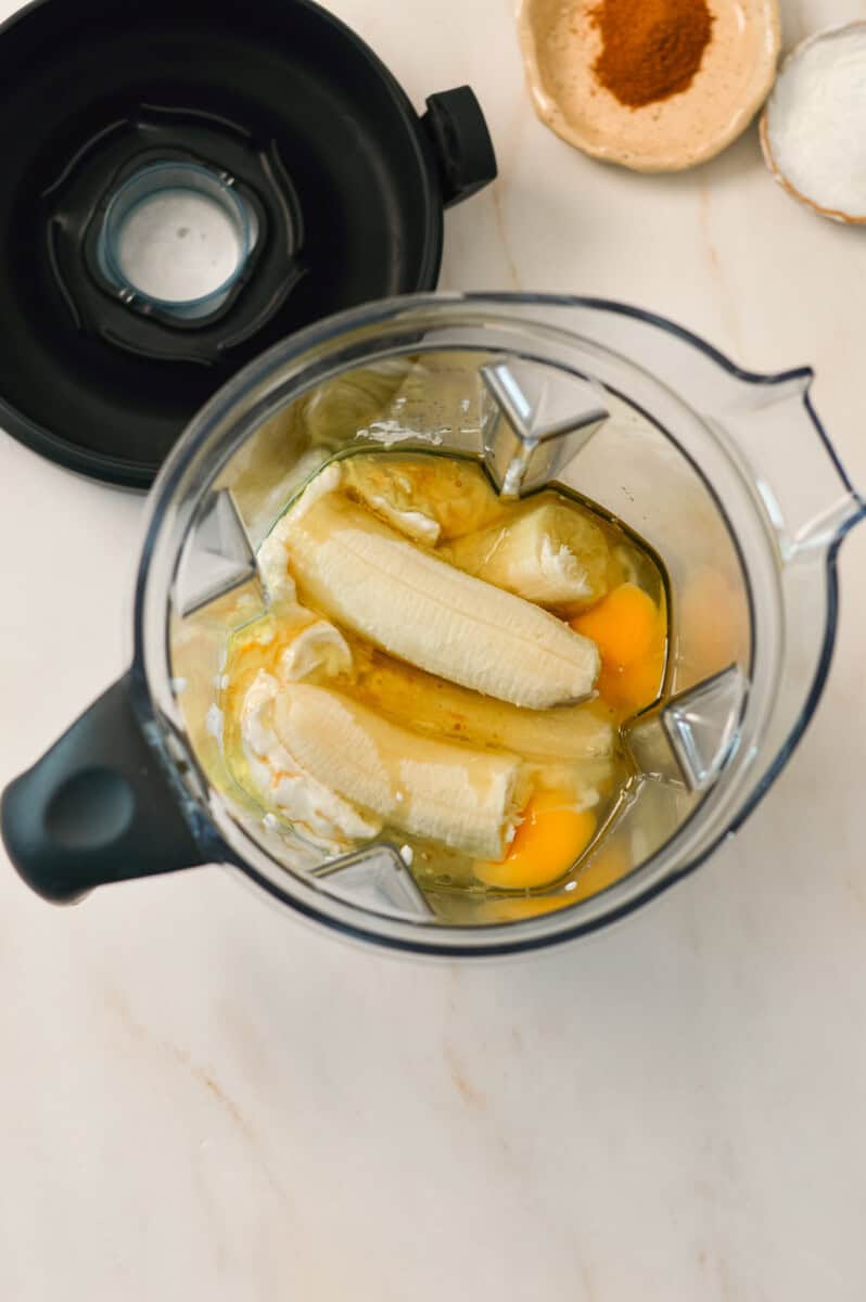 Wet ingredients added to a high powered blender.