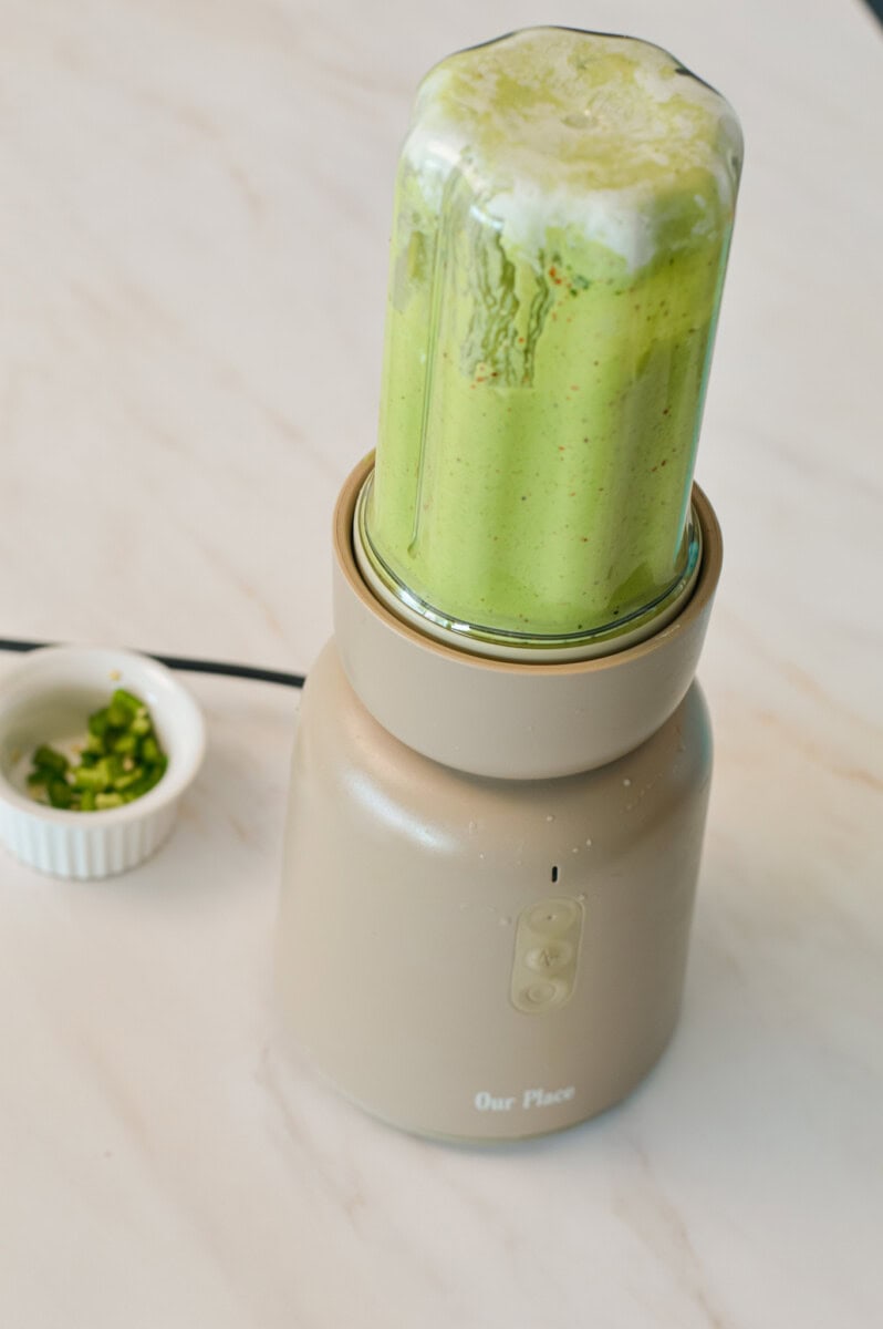 Ingredients for the avocado crema in the blender.
