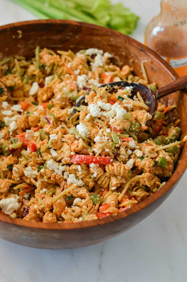 High protein and mayo-free buffalo chicken pasta salad in a bowl.