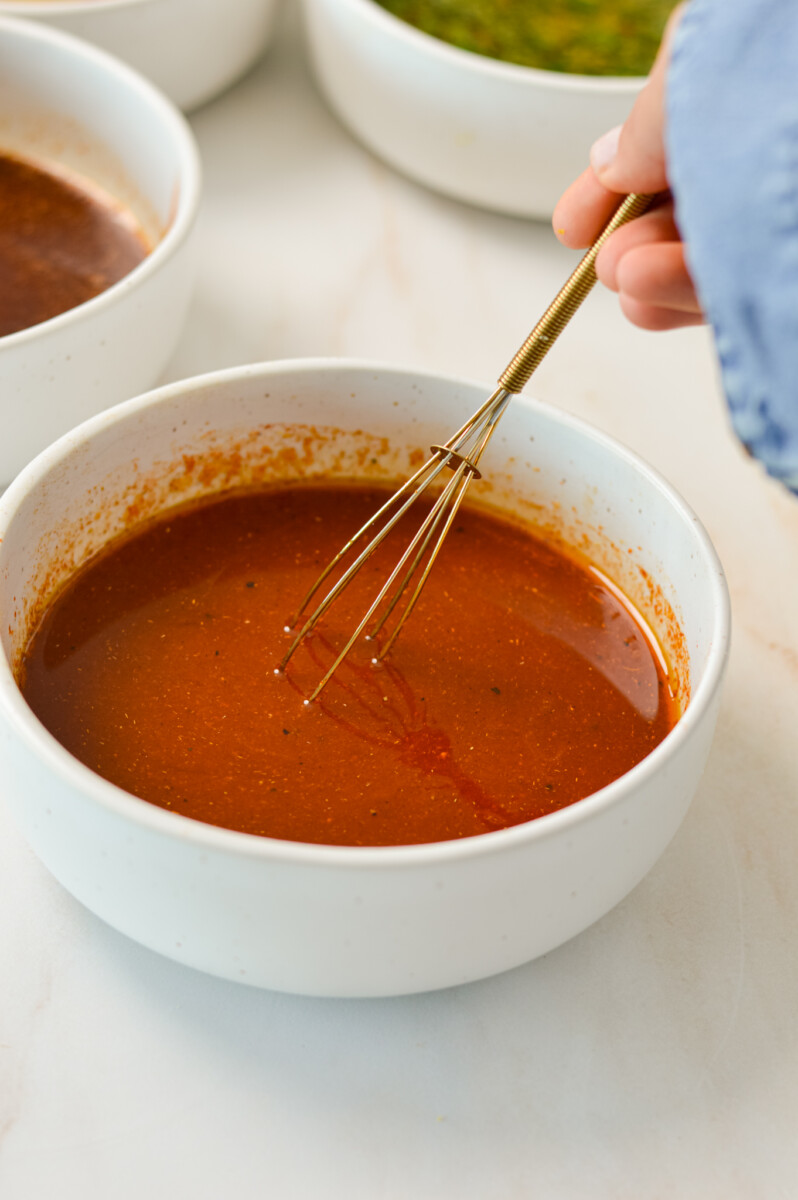 Chicken marinade being whisked.