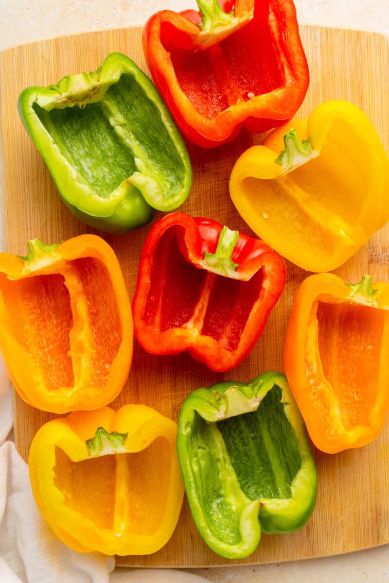Sliced bell peppers on a cutting board.