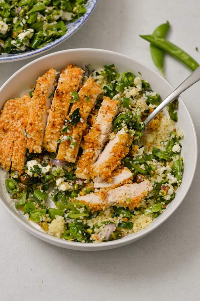 Snap pea salad with crisy chicken.