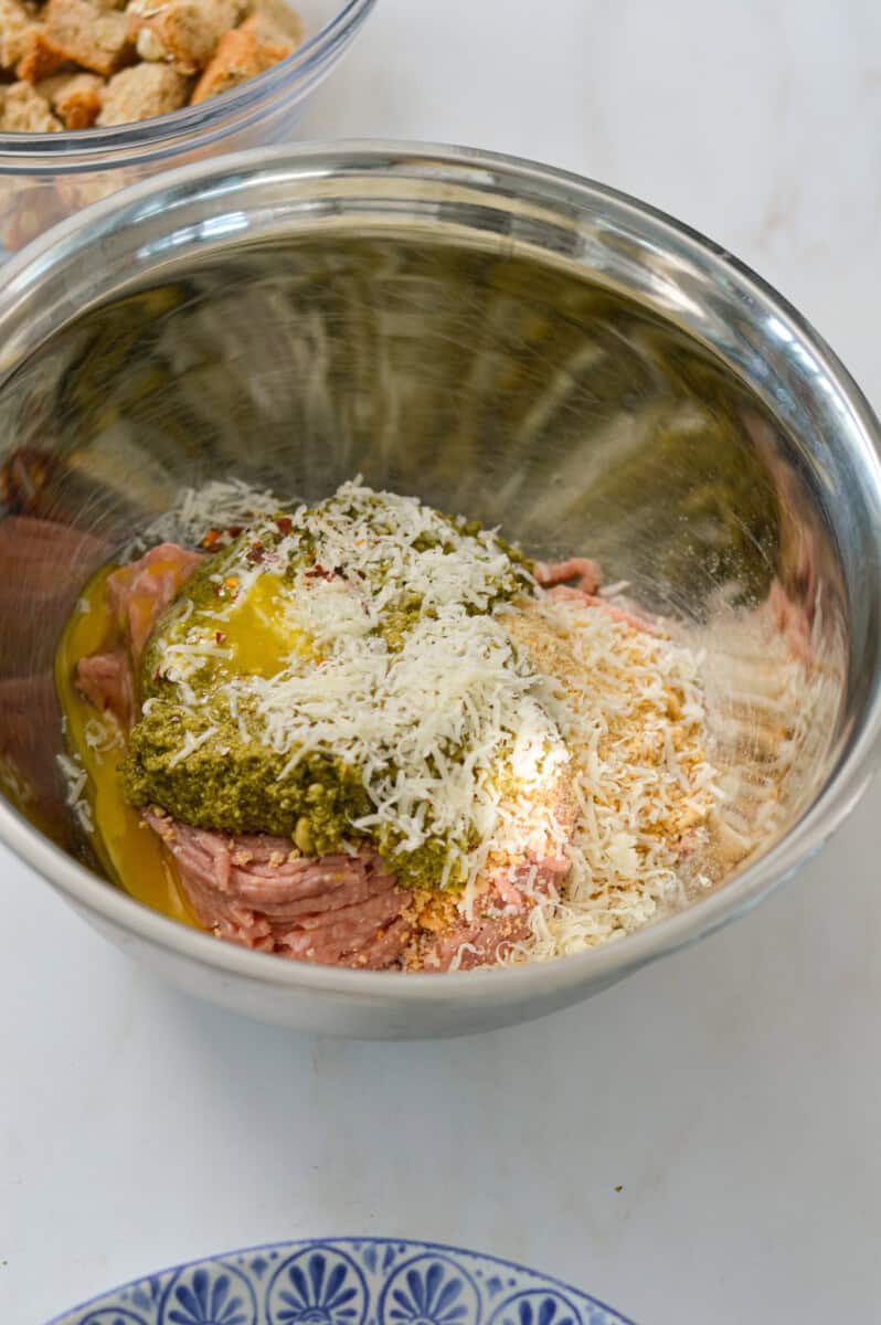 Meatball ingredients in a mixing bowl.