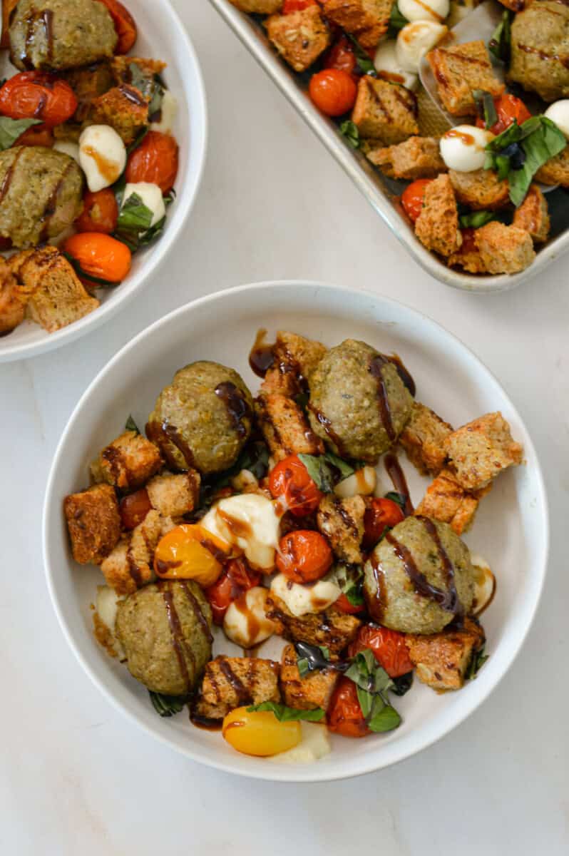 Birdseye of pesto chicken meatball dinner in a bowl.