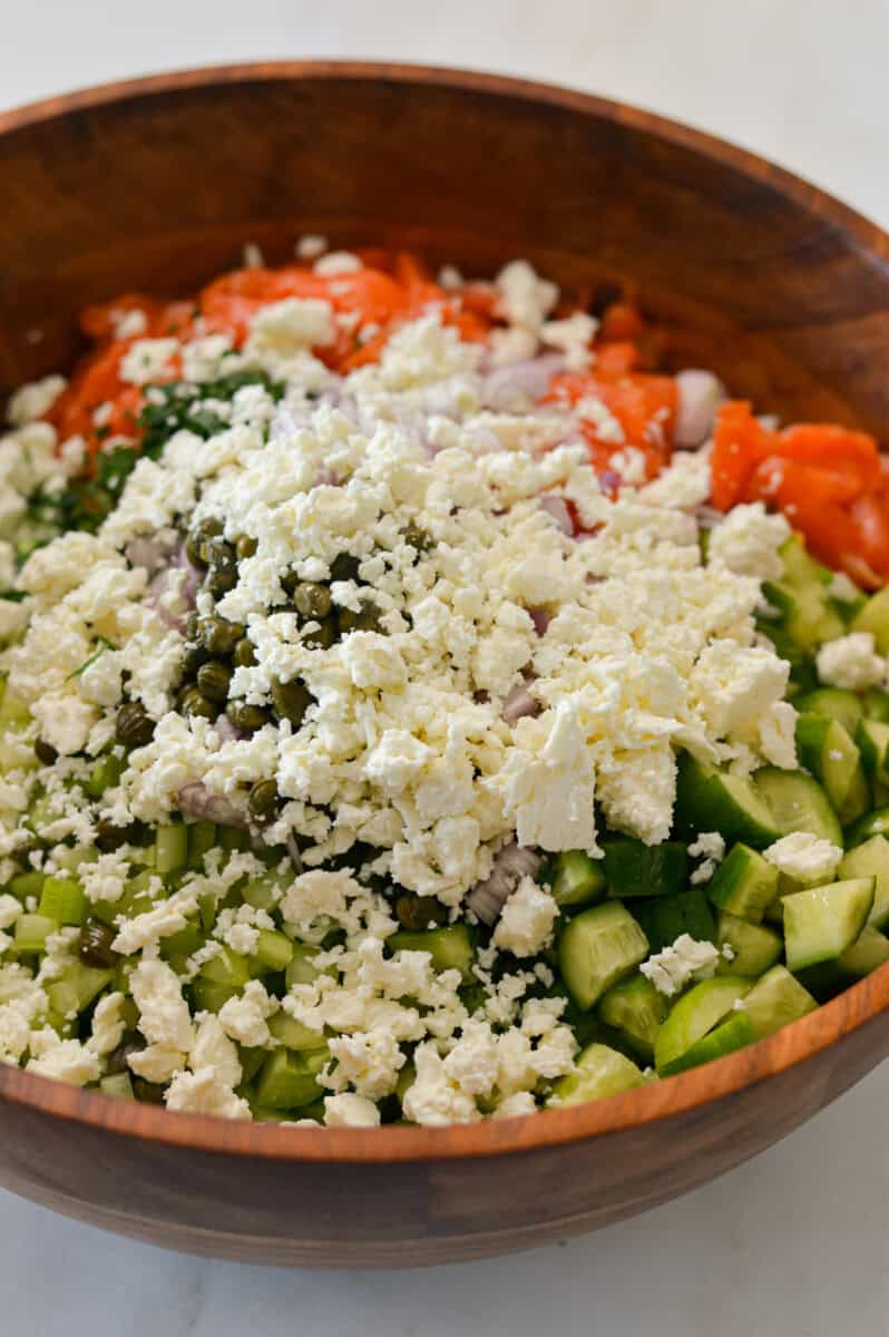 All ingredients for chickpea feta salad in a bowl.