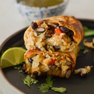 Green Chili Chicken Freezer Burrito on a plate.